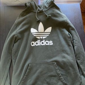 Large green adidas sweatshirt.